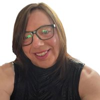 Smiling driving instructor Amanda Jayne standing beside Horizon Driving School car in Stockton-on-Tees, LGBTQ+ safe space